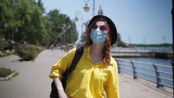 Lifestyle, Young Woman Wearing Glasses and Medical Mask To Protect Against Virus and Infection