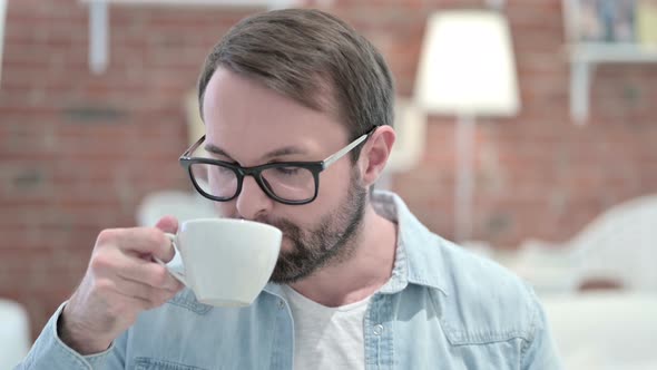 Portrait of Beard Young Man Having Toothache By Drinking Cold