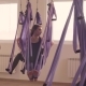 Group of People Doing Aerial Yoga Asanas in Gym - VideoHive Item for Sale