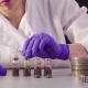 The Scientist's Hands Hands Close Bottles with Samples - VideoHive Item for Sale