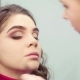 Makeup Artist Painting Black Eyeliner on the Eyes - VideoHive Item for Sale