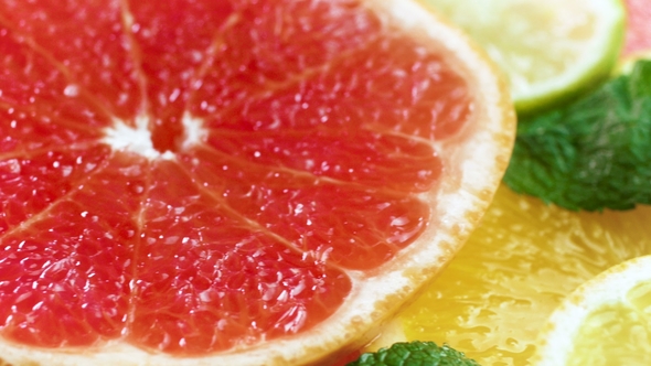 Footage of Orange, Grapefruit and Lemon Slice Lying on Table
