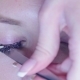 Master in a Beauty Salon Removes the Old Eyelashes - VideoHive Item for Sale