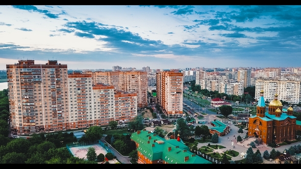 View of the Evening City of Krasnodar in Russia. Sunset.  Day To Night