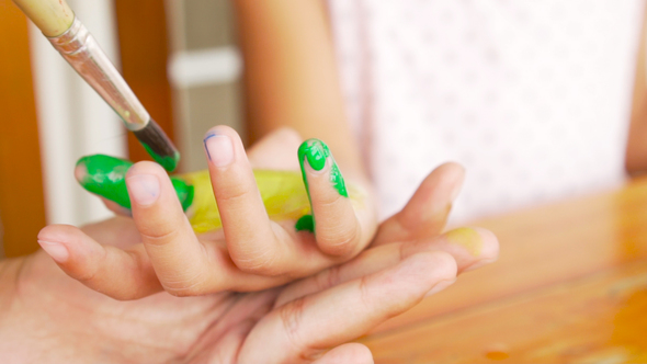 Close up of child's palm painted