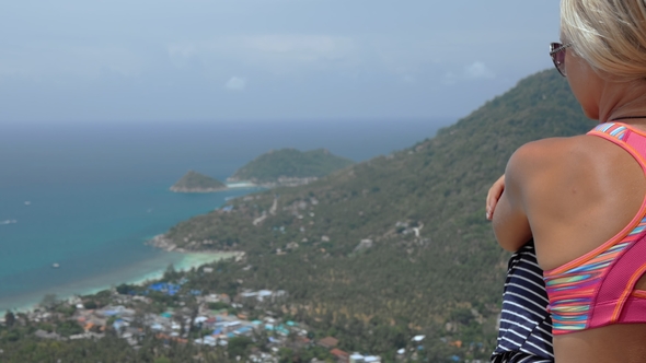 Girl Sitting on the Top of an Viewpoint in Direction To Sairee Beach and Nang Yuan Island in