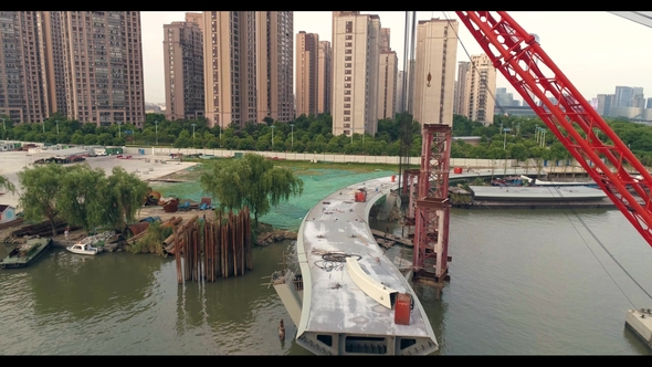 Aerial View of Floating Crane, Pedestrian Bridge Construction alt