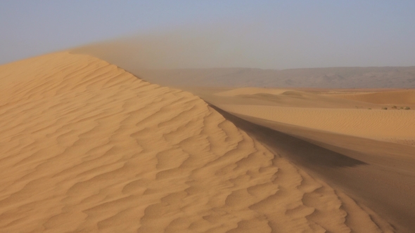 Sand Blowing in Sand Dunes in Wind, Sahara Desert