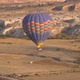 Colourful Hot Air Balloon with Basket Hovers Over Highland - VideoHive Item for Sale