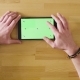Male Hand Scrolling a Tablet with Green Screen - VideoHive Item for Sale