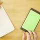 Male Hands Scrolling the Tablet with Green Screen - VideoHive Item for Sale