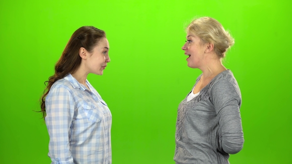 Woman Gives the Keys To Her Daughter. Green Screen