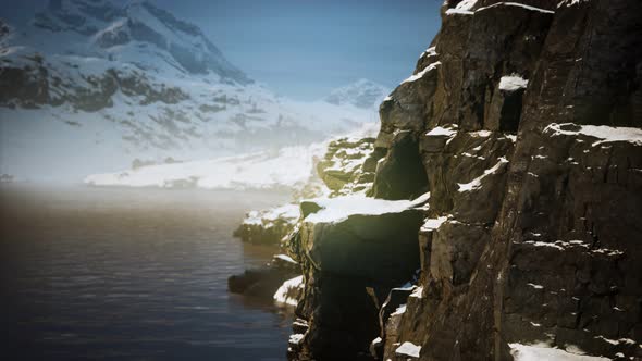 Snow Covered Mountains in Northern Ocean