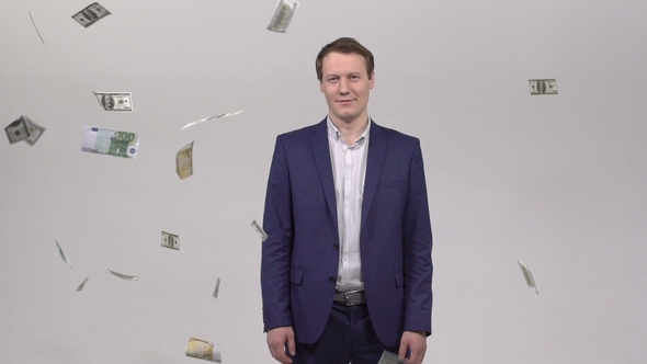 Businessman Stands in the Rain Out of Money in a White Studio
