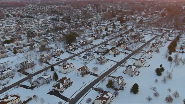 Aerial View of the Residential Districts Individual Houses in Small Town of on a Snowy Winter Day