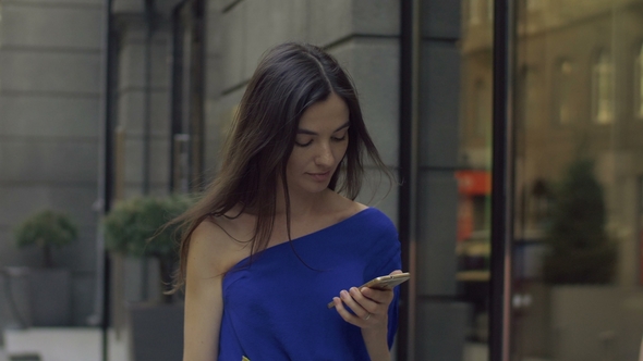 Excited Shopper Woman Showing Purchase To Her Friend