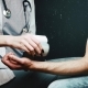 The Doctor Measures Blood Pressure. The Man Is a Patient. Clinic of Health. - VideoHive Item for Sale