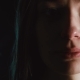 A Sad Woman Is Crying. The Girl Is Depressed. A Woman in a Dark Room. Tears Roll Down Her Cheeks. - VideoHive Item for Sale