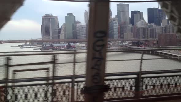 View of the world famous Brooklyn Bridge over The East River and beautiful lower Manhattan from the