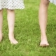 Children Feet on Green Grass - VideoHive Item for Sale