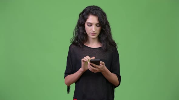 Young Beautiful Woman Using Phone