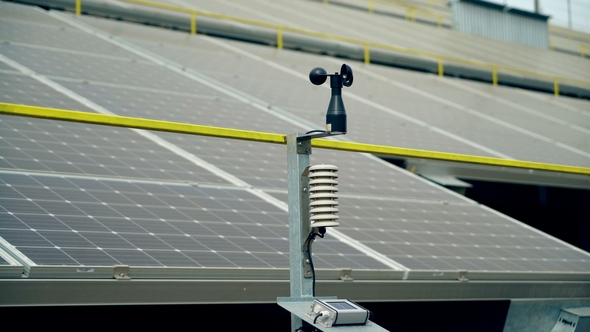 Meteorological Instrument Used To Measure Wind Speed and the Solar Cell System. Solar Farm