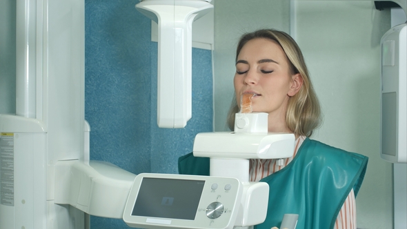 Young Woman Doing Dental Panoramic Skull Scan
