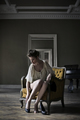 Woman sitting on an armchair - PhotoDune Item for Sale