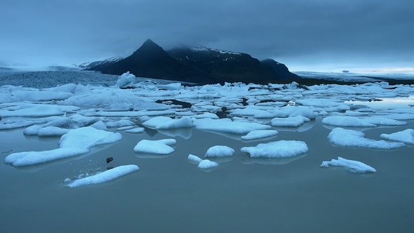 Glacier on Black Volcanic Beach, Iceland