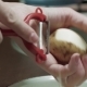 Women's Hands Peel Potatoes - VideoHive Item for Sale