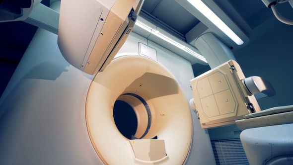 Tomographic Machine's Elements Moving. An Empty MRI CT PET Scanner.