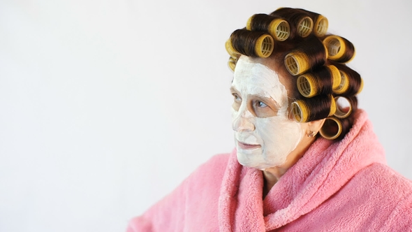 Wicked Wife with a Cosmetic Mask and Curlers