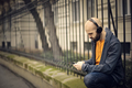 Man listening to music outdoor - PhotoDune Item for Sale