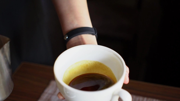 Waiter Make Coffee in a Cup