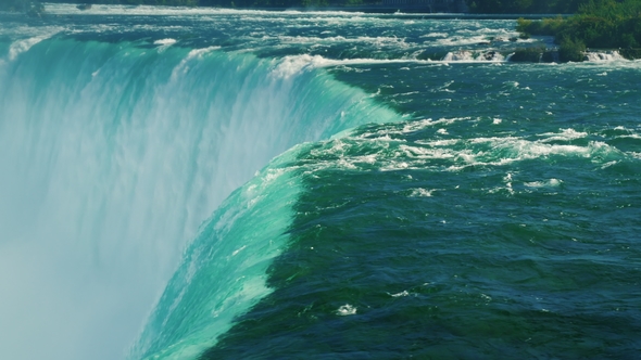 A Powerful Stream of Water Niagara Falls Falls Down. The Incredible Power of Nature