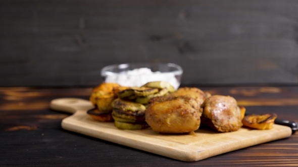 Healthy Dinner Made of Grilled Vegetables and Fried Chicken