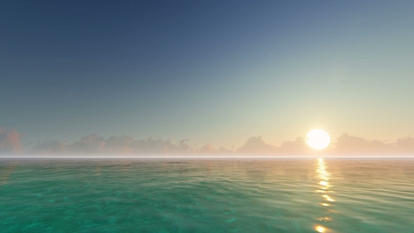 Sunrise on a Calm Ocean and Blue Sky alt