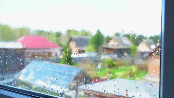 Raindrops on a Plastic Window.