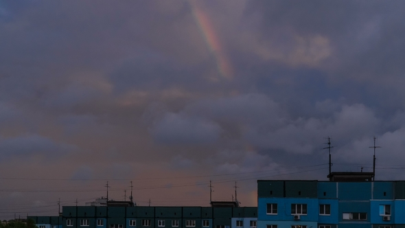 Cloudy Dawn and Rainbow