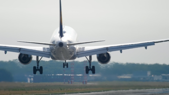 Airplane Landing at the Early Morning