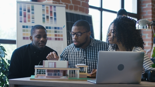 Ethnic Colleagues Creating Futuristic Accommodation