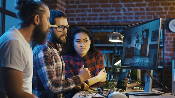 Men Creating Cartoon on Computer