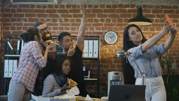 Cheerful Colleagues Taking Selfie with Pizza