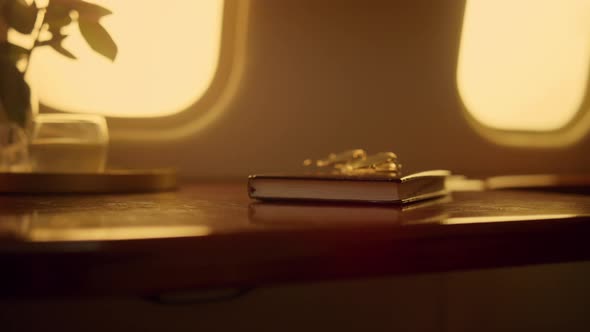 Woman Touching Pad Screen in Luxury Airplane