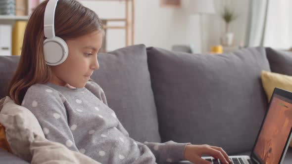 Girl Playing on Computer