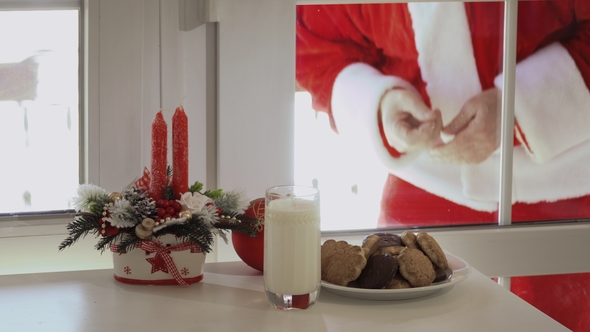 Santa Claus Want To Taste Milk and Cookies and Look Through a Glass