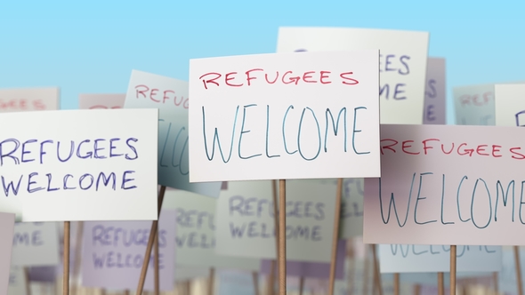 REFUGEES WELCOME Placards at Street Demonstration alt