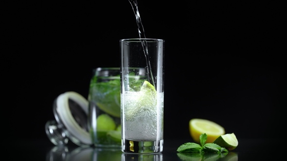 Lemonade with Lime Lemon Mint in Cold Sparkling Soda Water Refreshing Non Alcoholic Mojito Cocktail