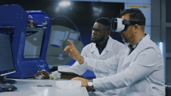 Scientists Working with 3d Printing and VR