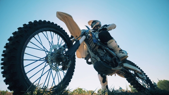 Portrait of a Motorcycle with a Rider on It